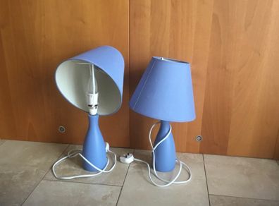 Two blue bedside lamps