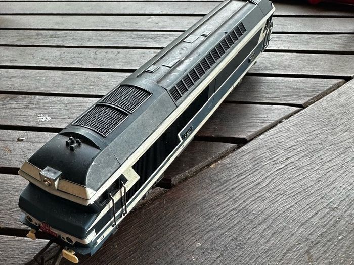This engine is a vintage Jouef OO scale (1/87) SNCF CC 72001 diesel model locomotive featuring the classic French railway blue and white livery.