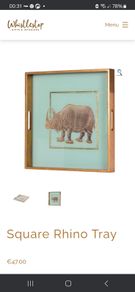 Gilt tray featuring rhino