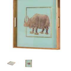 Gilt tray featuring rhino