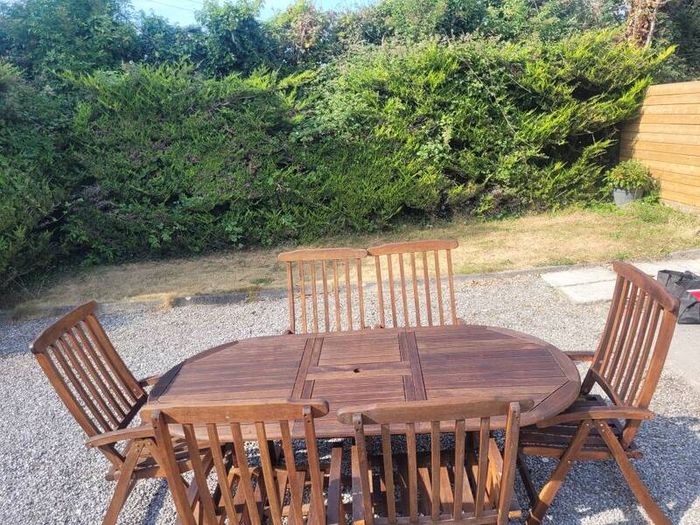Teak Garden extending table and 6 reclining armchairs