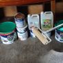 a selection of paint and a paint roller and some good paint brushes Image 5