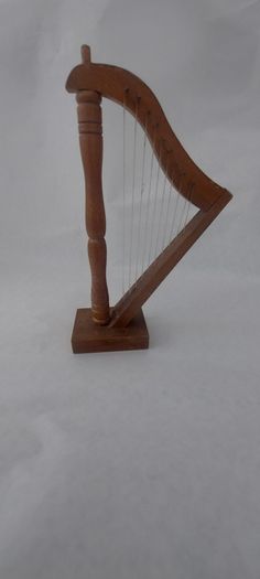 handcrafted wooden display harp ,,lovely display item for any man cave pub restaurant etc etc etc, buyer collects or pays postage.