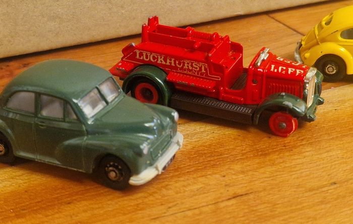 4 vintage toy cars -