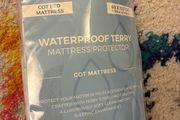 Free cot bed mattress protector