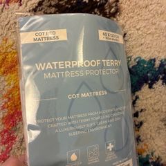 Free cot bed mattress protector