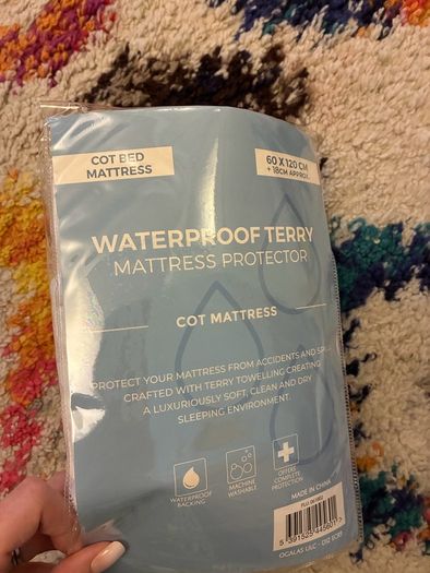 Free cot bed mattress protector