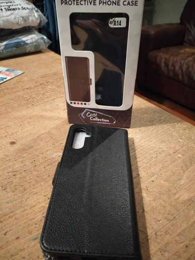 Black Multi functional phone case.  New in box.