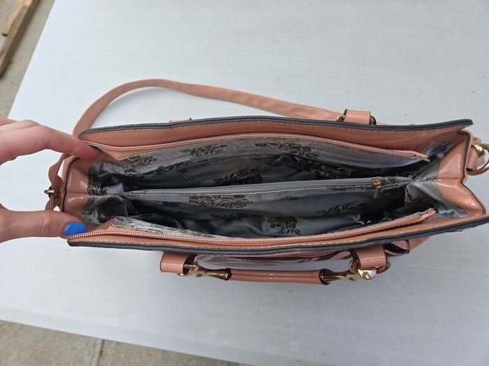 pink and black handbag