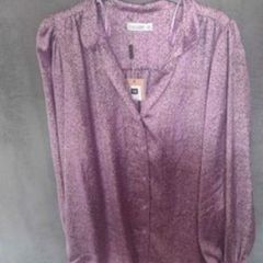 woman's lilac blouse. New