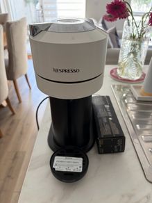 nespresso coffee machine with pack of capsules