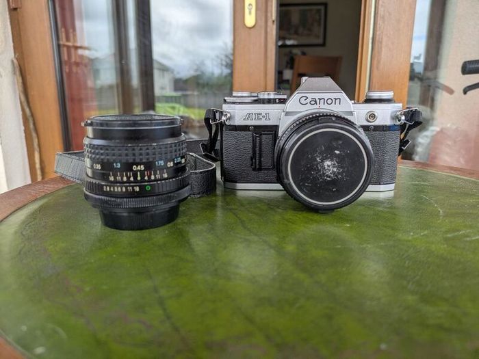 Canon AE-1 + FD 50mm f/1.8 + Tokina 28mm f/2.8