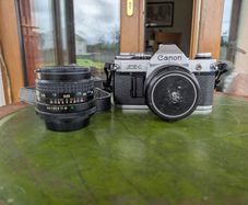Canon AE-1 + FD 50mm f/1.8 + Tokina 28mm f/2.8