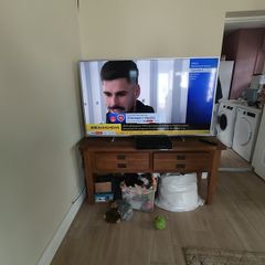 Philip's 65 inch TV working perfectly and solid oak dresser 59 inches wide