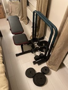 Weights, benches, rings, boxing gloves, slant board