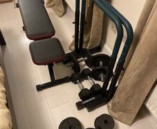 Weights, benches, rings, boxing gloves, slant board