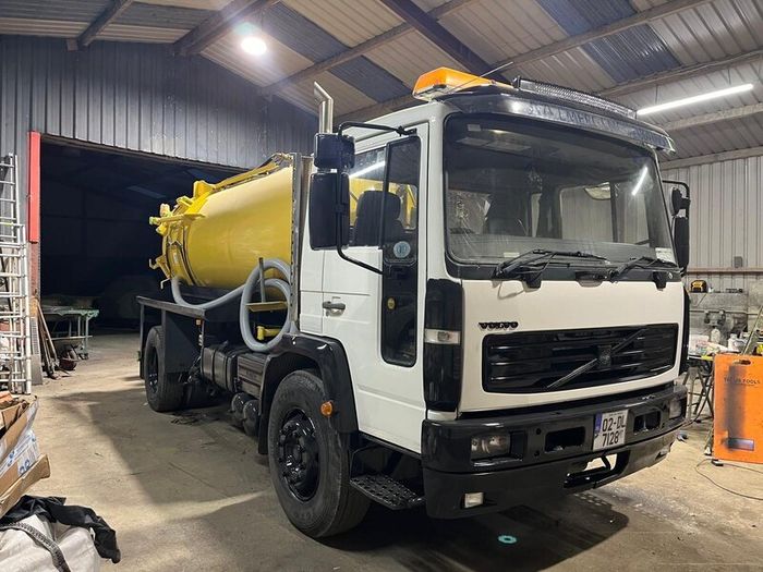 Volvo truck with whale vacuum tanker jetter