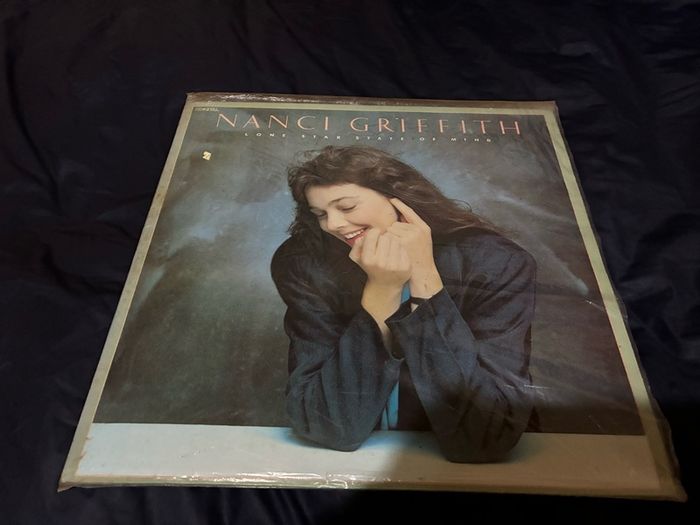 A Nanci Griffith record collection.