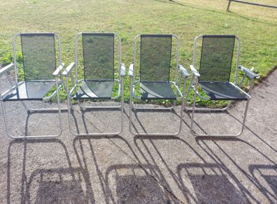 4 Garden Chairs in excellent condition, and fold away nicely for storage, great for camping trips