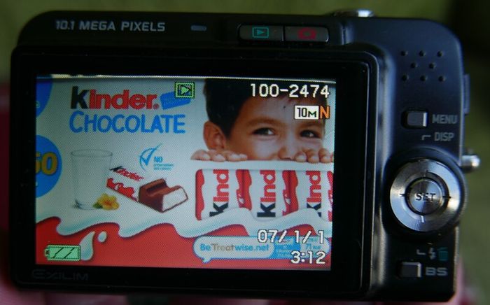Casio Exilim EX-Z1050 Digital camera Made w/ Box and Accessories , universal charger- Tested