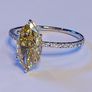 14k Gold ring with 2.29 ct Lab-Grown Diamond, 2.11 ct main yellow diamond cerified by IGI and Laser inscripted Image 4