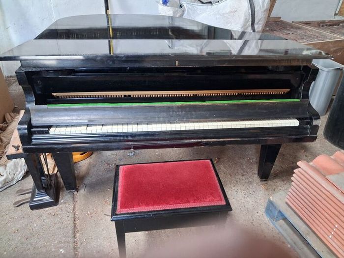 C. Bechstein baby grand piano