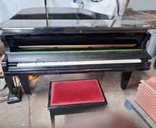 C. Bechstein baby grand piano