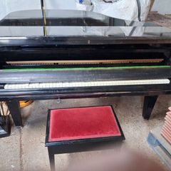 C. Bechstein baby grand piano
