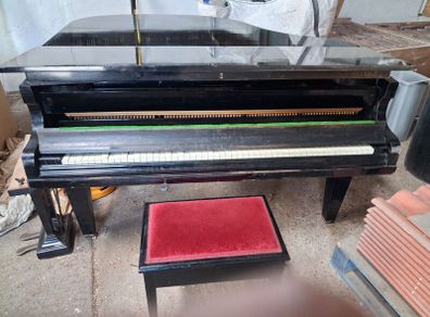 C. Bechstein baby grand piano