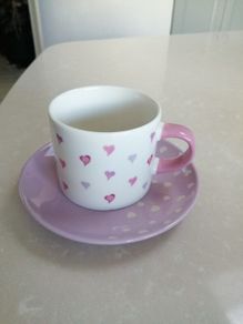 Considered by Helen James mug on plate