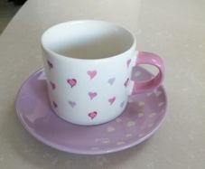 Considered by Helen James mug on plate