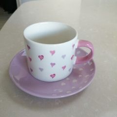 Considered by Helen James mug on plate