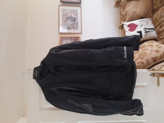 Selection of quality motorbike jackets,  trousers,  helmets  , and boots ..
