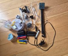 Misc aquarium accessories and three small heart shaped pet bowls