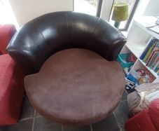 Leather swivel love seat
