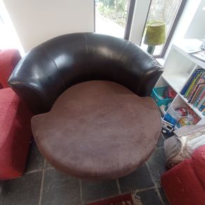 Leather swivel love seat