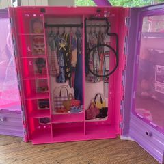 Barbie campervan, wardrobe and gymnastics bar, lots of spare of accessories also included (no photo)