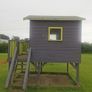 Playhouse with slide and swings Image 4