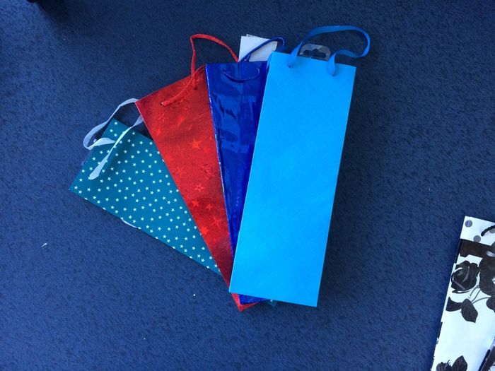Bottle gift bags price for the four