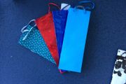 Bottle gift bags price for the four