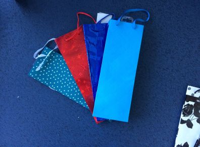 Bottle gift bags price for the four