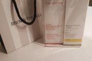 FREE tote bag or cosmetic bag with these items - Clarins Tonic Bath and Shower Concentratel and Hand and Nail.Treatment Cream 100 ml - Brand New - Gift Wrapped