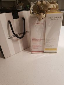 FREE tote bag or cosmetic bag with these items - Clarins Tonic Bath and Shower Concentratel and Hand and Nail.Treatment Cream 100 ml - Brand New - Gift Wrapped