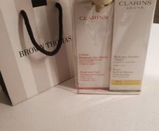FREE tote bag or cosmetic bag with these items - Clarins Tonic Bath and Shower Concentratel and Hand and Nail.Treatment Cream 100 ml - Brand New - Gift Wrapped