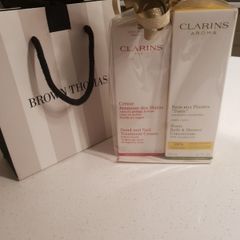 FREE tote bag or cosmetic bag with these items - Clarins Tonic Bath and Shower Concentratel and Hand and Nail.Treatment Cream 100 ml - Brand New - Gift Wrapped