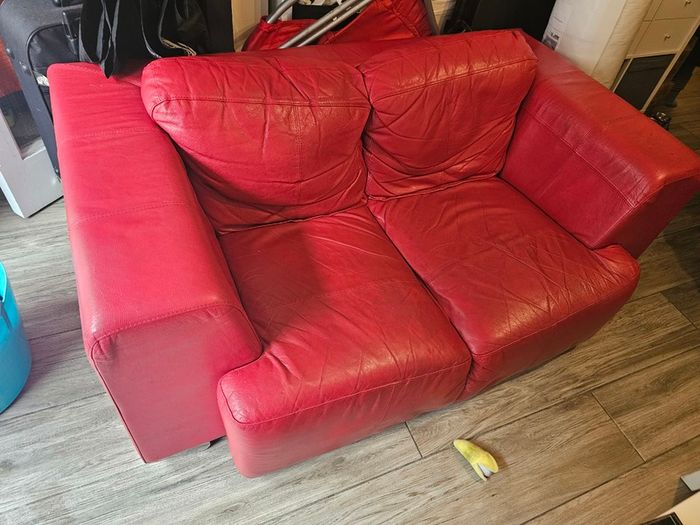 Red Leather two seater couch