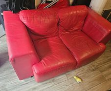 Red Leather two seater couch