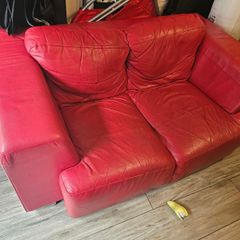 Red Leather two seater couch