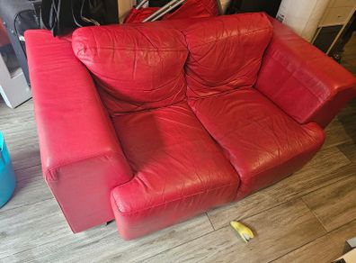 Red Leather two seater couch