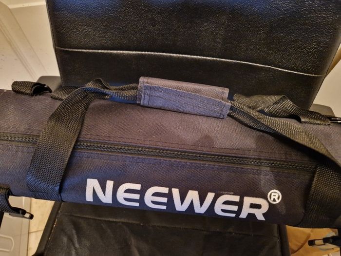 NEEWER, 2 Photography Tripods and feet and also 5ft circular Silver Light enhancer all in new condition and in lovely cases